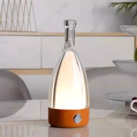 Lampe de table transparente orange Bottle